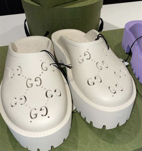 crocs vs gucci slides
